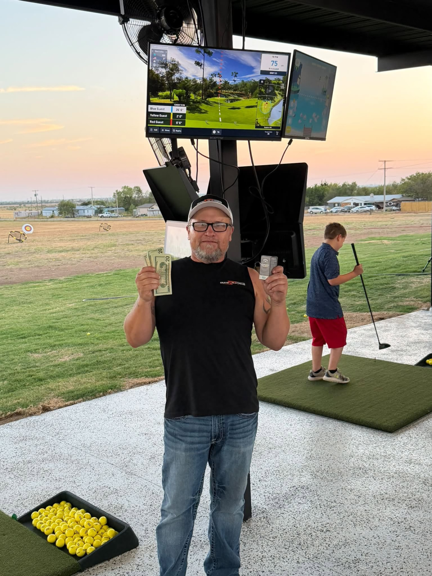 Guests enjoying The Back Nine Toptracer range, community photo 3